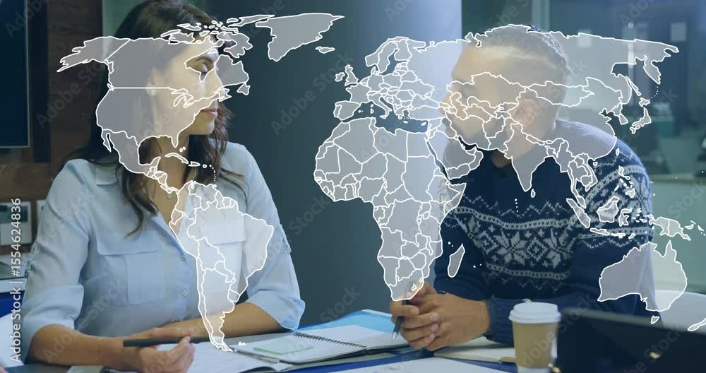 Poster colleagues initiating business meeting by overlaying transparent world map and annotating charts