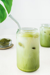 Refreshing Iced Matcha Latte in Glass. Antioxidant-Rich and Plant-Based Energy Drink