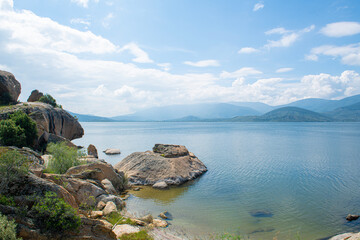 Spectacular Bafa Lake view in sunny and cloudy weather. Reflections in Bafa Lake. View of Bafa Lake Nature Park in T&uuml;rkiye.