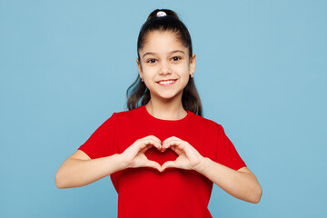Little kid girl 8-9 years old wears red t-shirt show shape heart with hands heart-shape sign...