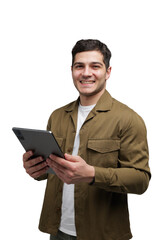 Standing young man smiling while holding a tablet, showcasing confident expression