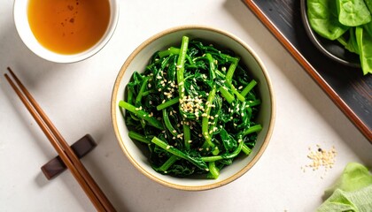 Ultra-Realistic Top-Down View of Small Bowl of Goma Ae Spinach Dressed in Sesame with Tea and Fresh Spinach on a Neutral Background