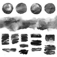 set of abstract gray and black brushstrokes, various blots, lines, splatters, and smudges, graphic design elements 