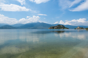 Bafa Lake in sunny weather. Historical castle and city wall ruins in Bafa Lake. Magnificent Bafa...