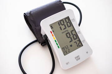 Close up on digital medical device to check systolic and diastolic blood pressure, heart rate....