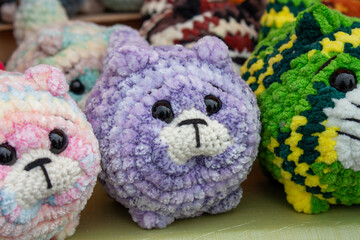 New soft knitted toys, hand made from yarn.
