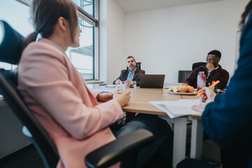 Colleagues collaborate on workplace ideas and plans, fostering creative solutions in a contemporary...