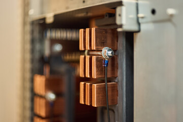 Close-Up of Electrical Copper Busbars in Industrial Power Distribution System