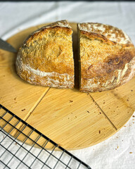 Artisanal gluten free bread held with care. Perfect for small bakery branding, social media, and...