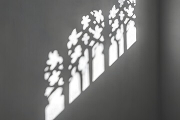 Obraz premium Sunlight casting intricate window shadows