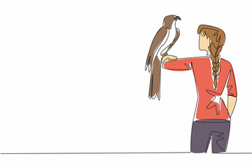 Single one line drawing eagle perched on hand of woman. A bird of prey that has very keen eyesight. Top predator in the food chain. Woman Holding Bird. Continuous line design graphic illustration