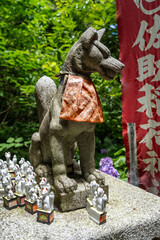 Inari fox statue at Sasuke Inari-jinja in Kamakura, Japan