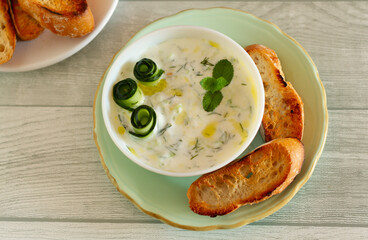 Tzatziki with cucumber salad and toasted bread - Greek yogurt dip