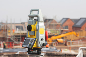 Close-up of Land surveyors equipment theodolite or total positioning station set by engineer on...