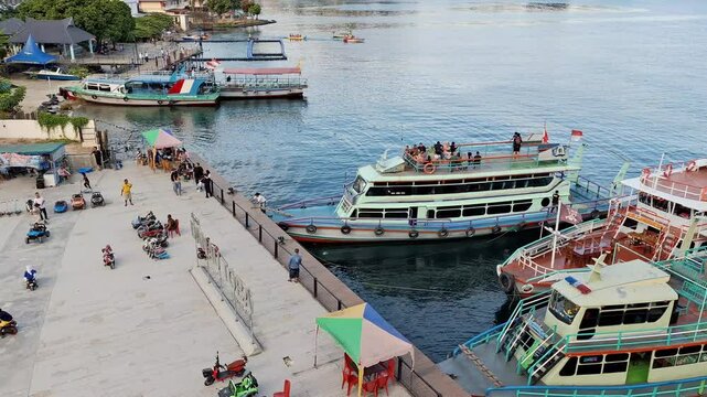 Local charter boats for inter-island crossings on Lake Toba carrying tourists, passengers and cargo. The ship travels from Parapat to the island of Samosir.