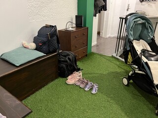Home and shoes off in the lobby. 
