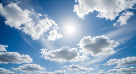 Fototapeta premium Bright sunny day: blue sky with puffy cumulus clouds, serene and peaceful atmosphere