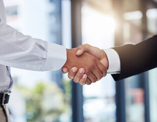 Business partnership meeting. Picture businessman’s handshake. Successful businessmen handshaking after good deal. Horizontal, blurred background