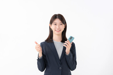 女性　スマートフォン　スマホ　笑顔