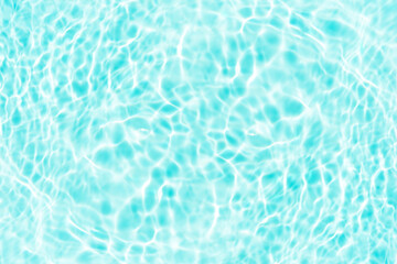 Blue water with ripples on the surface. Defocus blurred transparent blue colored clear calm water...