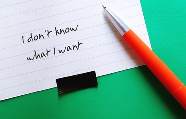 Note on green background written - I Don’t Know What I Want - feeling lost, bored and restless...