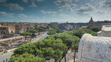view of the roman forums and colosseum in rome