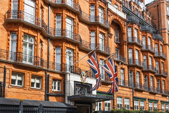 Claridge Hotel London. Red Brick Facade with Union Jack Flags. London, UK, 14 April 2024