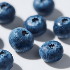 Fresh Blueberry Fruits on White Surface with Natural Light and Textural Details