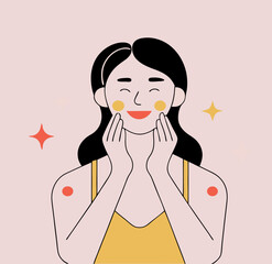 Beautiful woman with smooth skin is smiling while touching her face, radiating joy