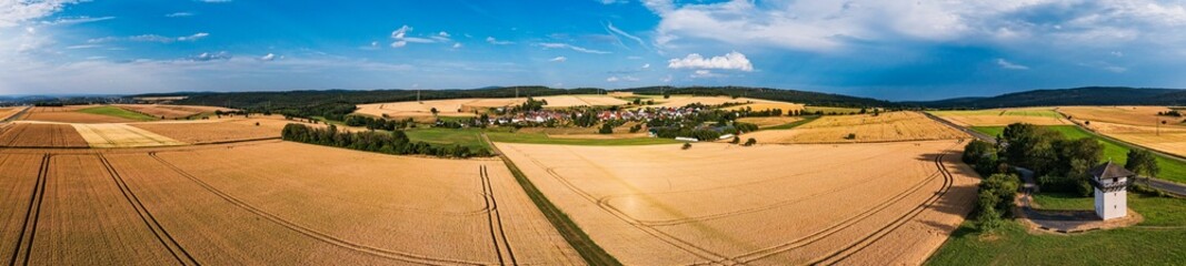 A bird's eye view of grain fields near Idstein in the Taunus Mountains, with a replica of a...