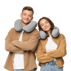 Two young travelers with neck pillows and bags smiling confidently isolated on transparent background (5)