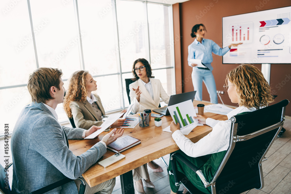 Aufkleber group of diverse business professionals collaborating on a teamwork project in a modern office space