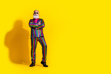 Photo of confident groomed macho man wear stylish striped bright outfit standing empty space...