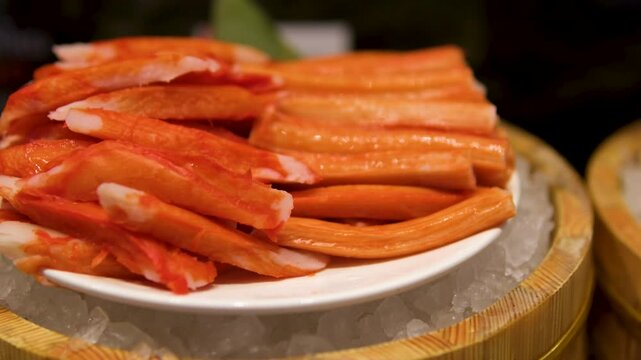 Crab sticks, aka imitation crab or surimi, mimic crab meat in taste, texture, and appearance. They're made from minced white fish like pollock or hake, not actual crab. . High quality 4k footage