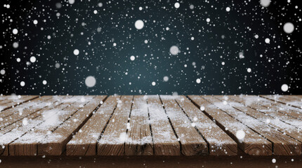 Empty wood table top with snowfall and bokeh cafe restaurant in night winter background.For holiday,christmas day and new year concept.