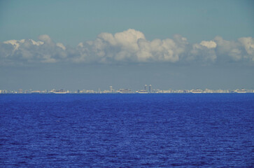 Modern cruiseships cruise ship liners Magica, Seaside, Armonia and Fortuna anchored offshore of...