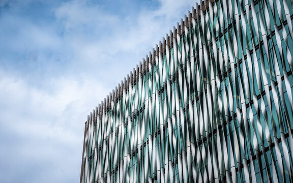 Blue Architecture. A low angle, abstract view of a modern London skyscraper on a bright day with copy space.