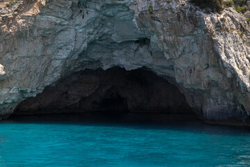 stunning blue cave with clear turquoise water