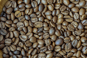 Coffee beans as a background macro photo. Coffee beans, caffeine.