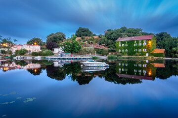 Sunrise with reflection on the river of sevre nantaise in Vertou in Loire-Atlantique, France