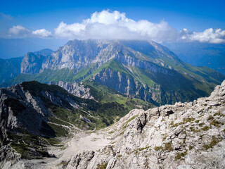 Rugged Alpine Peaks And Verdant Valleys In The Grigna Massif: Scenic Mountain Landscape In Lombardy...