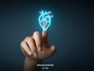 Human hand touching a glowing neon heart icon for organ donation
