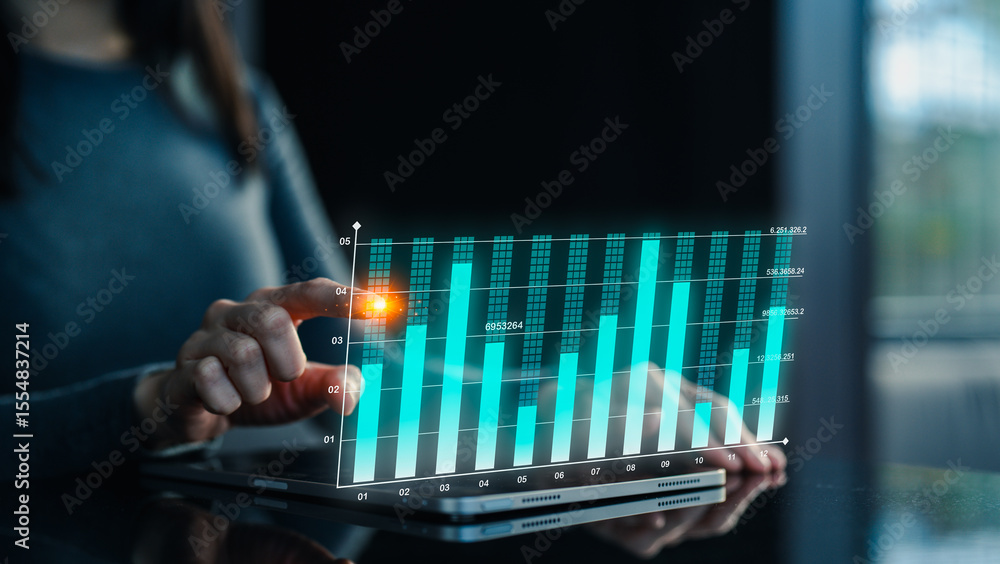 Poster a person interacts with a digital tablet displaying a glowing, futuristic bar chart hologram in a da