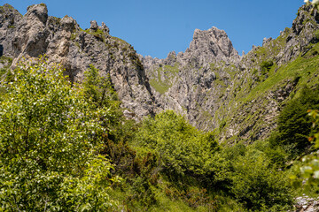 Rugged Alpine Peaks And Verdant Valleys In The Grigna Massif: Scenic Mountain Landscape In Lombardy Region Of Northern Italy Near Lake Como