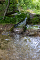 Water flows through a thin gutter