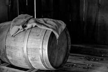 A rustic wooden barrel, reminiscent of 19th-century pioneer life, at Black Creek Pioneer Village, Toronto.