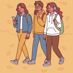 Group of diverse dark skinned teenagers walking together outdoors in autumn clothes, enjoying time and chatting on a cool seasonal day