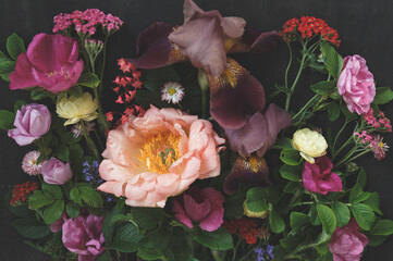 Vibrant Flower Bouquet with Irises and Roses. Floral art. Floral design. Botanical background.