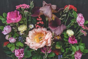 Vibrant Flower Bouquet with Irises and Roses. Floral art. Floral design. Botanical background.