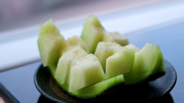 Winter melon sliced close up. horizontal footage winter melon, rotation background. High quality 4k footage